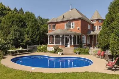 Image de Waterfront_Heated pool_Private acre yard_BBQ_ Wood Fireplace