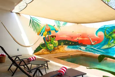 Image de Cadre privé-À quelques pas de la plage et marché-Lits king - Animaux acceptés!