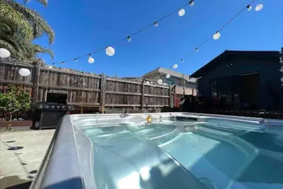 Image de Lovely & Modern 2 bedroom Home with Hot Tub & Gym