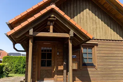 Image de Economy log cabin Fernando Magellan - own sauna, vacation with dog