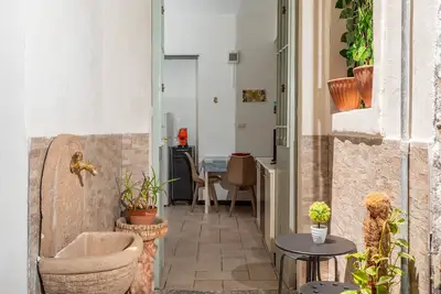 Image de Appartement 'Giulia's Home - Borgo' avec terrasse privée, Wi-Fi et climatisation