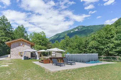 Image de Chalet 'Camillo' avec vue sur les montagnes, piscine privée et jardin privé