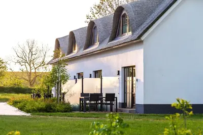 Image de Relaxation on the dyke - your vacation apartment in Tossens