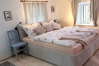 Image de Compact vacation apartment (36 m2) in a secluded location with fireplace, terrace & stream access