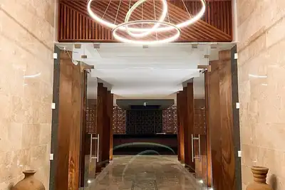 Image de Beautiful and luxurious loft in Aldea Zama, gym wifi cinema coworking room, swimming pool