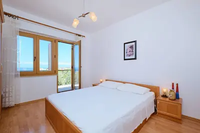 Image de Appartement de deux chambres avec la terrasse et la vue sur le mer Mali Losinj, Losinj (A-24690-a)