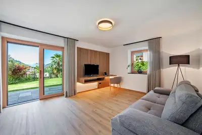 Image de Appartement Berta – neuf, confortable, avec terrasse de jardin et vue sur la montagne