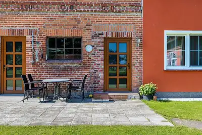 Image de Appartement de vacances 'Kranichnest' avec terrasse privée, jardin privé et Wi-Fi