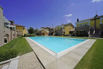Image de L'oasi del Lago - Deux Chambres Appartement, Couchages 4