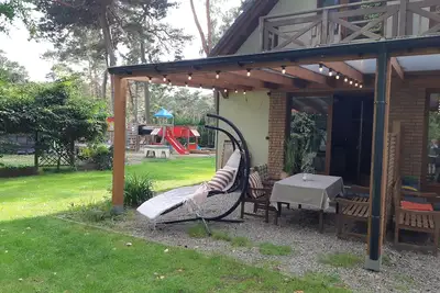 Image de Comfortable vacation homes 300 m from the beach, surrounded by a pine forest,