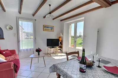 Image de Maison de vacances 'Plain-pied' avec terrasse privée, jardin partagé et Wi-Fi