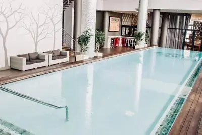 Image de Cosy Urban Apartment with 2-bedrooms, free WiFi, Pool & Gym in fabulous uMhlanga