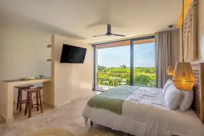 Image de Lalola Puerto Morelos 404 with roof top pool