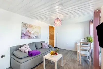 Image de Bungalow 'Die Aussicht' avec vue sur la montagne, terrasse privée et Wi-Fi