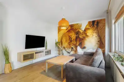 Image de Bungalow 'Löwe' avec terrasse commune, jardin commun et Wi-Fi