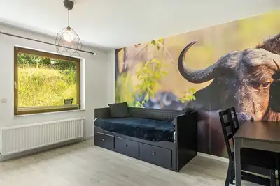 Image de Bungalow 'Der BĂĽffel' avec terrasse commune, jardin commun et Wi-Fi