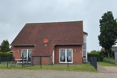 Image de Nimali semi-detached house in the seaside resort of Neßmersiel