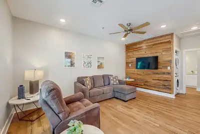 Image de Inviting coastal home with shared pool and stocked pond - steps to the beach