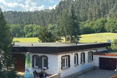 Image de Bungalow avec terrasse couverte en Harz