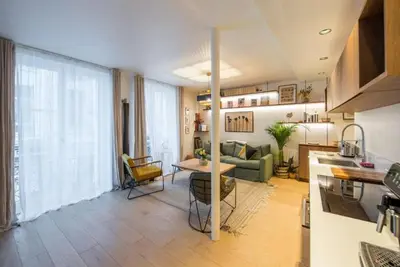 Image de Charming 3-bedroom apartment with WiFi, Ac in serene Paris