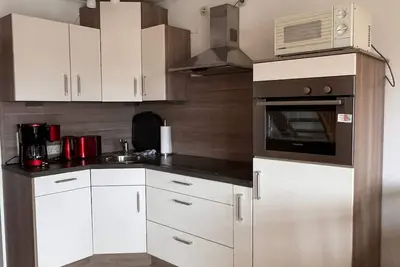 Image de Large apartment in Hooksiel (max 7 persons) with balcony and beach chair on the beach,
