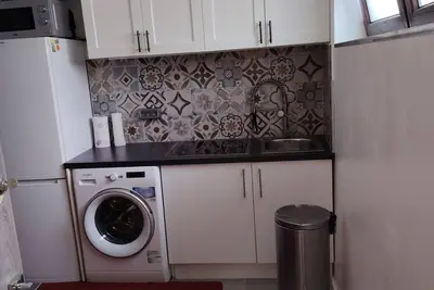 Image de Apartament dans un pavillon avec jardin