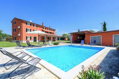 Image de Casa Rossa 5, an attic 3 br apartment with swimming pool