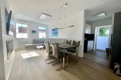 Image de Appartement \"Hafenblick\" avec vue sur la mer, terrasse privée et Wi-Fi
