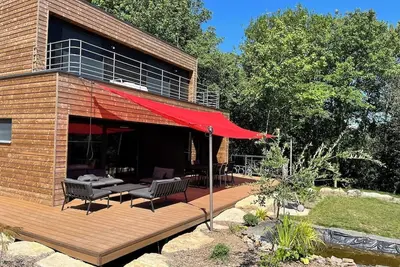 Image de Jolie maison en bois, Ilot de verdure en centre ville. 35 minutes des plages
