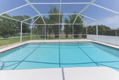 Image de Charming 3-bedroom pool home with fast WiFi, Ac in awesome Port St. Lucie.
