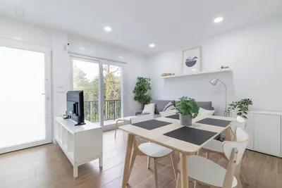 Image de Appartement 'RĂa De San Cosme Laxeira' avec vue montagne, jardin partagĂ© et climatisation