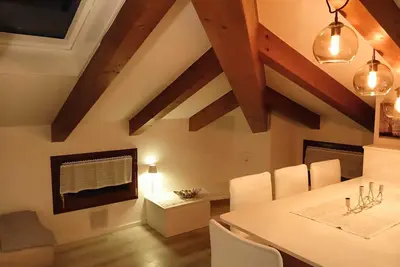 Image de Elegant attic with Dolomites view, relaxation and nature in Levico Terme.