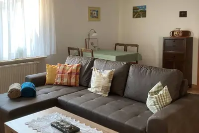 Image de Appartement 'Erdgeschoss' avec vue sur les montagnes, terrasse partagée et Wi-Fi
