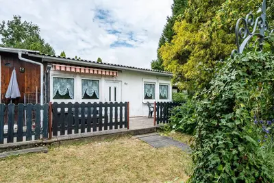 Image de Maison de vacances 'Bungalow 91' avec terrasse et jardin privés