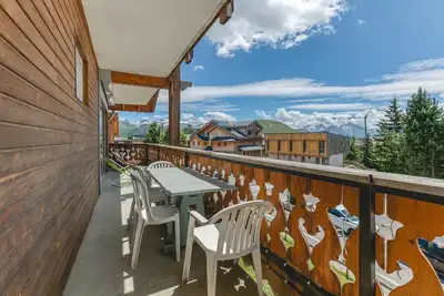 Image de Appartement 'Crocus 4-5 55m2' avec balcon et Wi-Fi