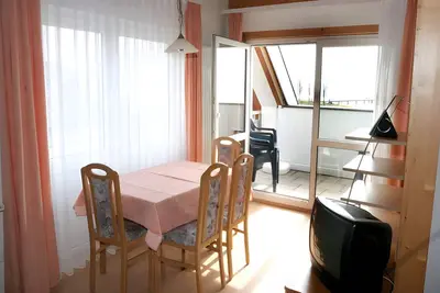 Image de Appartement \"Typ B 24\" avec vue sur le lac, jardin partagé et Wi-Fi