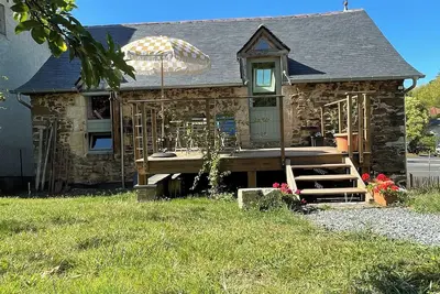 Image de Loft avec terrasse et jardin dans une grange rénovée