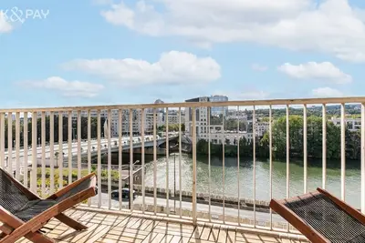 Image de Appartement vue sur la Seine à 10' en voiture de la Tour Eiffel parking gratuit