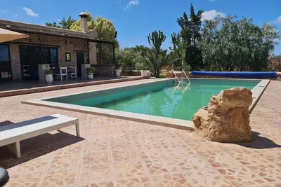 Image de villa Riad Ahlam avec piscine au milieu des arganiers