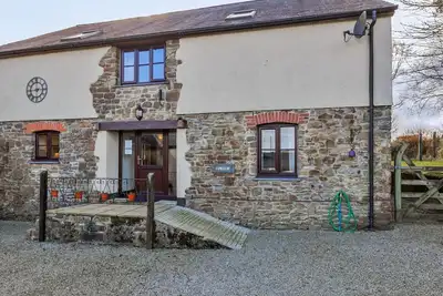 Image de Merveilleuse maison de vacances pour 10 personnes avec Wifi, terrasse, animaux admis et parking