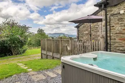 Image de Belle maison de vacances avec Wifi, bain à remous, terrasse, animaux admis et parking
