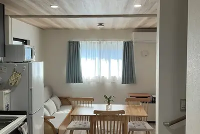 Image de Short-stay accommodations in a house with a modern Japanese design near Minato Mirai, within walking distance of Yokohama Station, with open access to the 1st floor, 2nd floor, and rooftop balcony