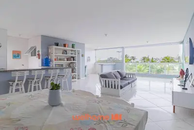 Image de Apartamento em Bertioga com vista para o mar
