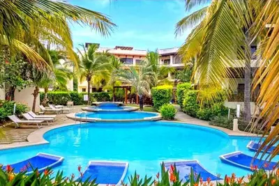 Image de Beach Chic Rooftop Townhouse – Walk to Coco Beach