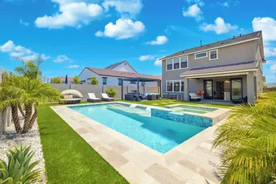 Image de Resort style 4-bedroom house, heated pool/hot tub, fitness room in Queen Creek