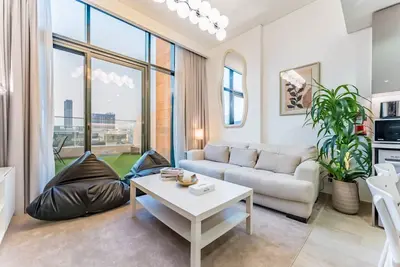 Image de Balcony Overlooking Community with Burj Khalifa Glimpse, Few Minutes to Downtown