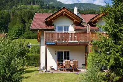 Image de Chalet avec jardin près de la piste de ski