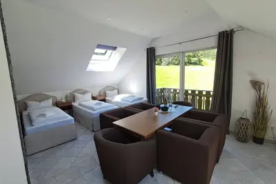Image de Comfortable rooms with kitchen - perfect for relaxation, work and exchange -