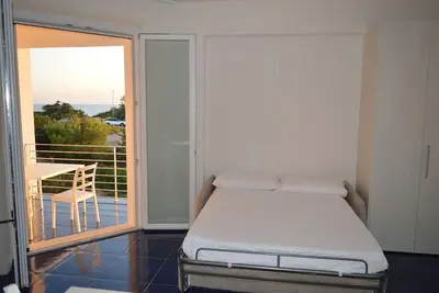 Image de Myrtle studio apartment with sea view terrace, in the dunes 20m from free beach