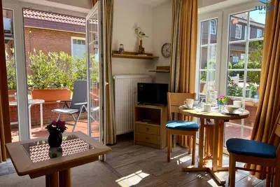 Image de Cozy maisonette apartment with sun terrace near the beach.